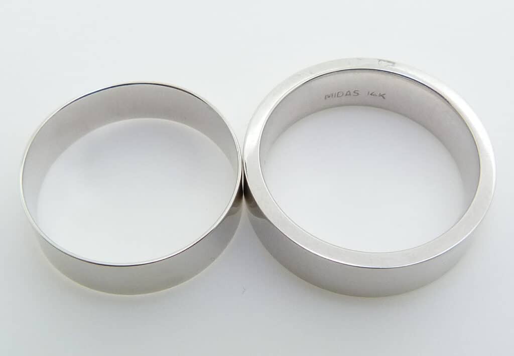 Side view of the same two rings show that the mall ring is very thin, where ours is 6x heavier.