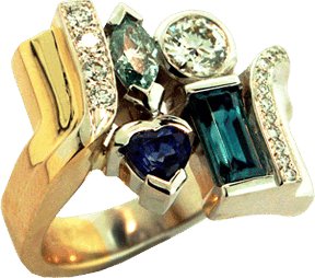Yellow and White Gold Family Ring with Hearts On Fire&reg; Diamonds, Blue Zircon, Green-Blue Marquis Diamond and Heart shaped Blue Sapphire