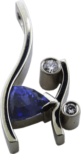Triangular cut tanzanite and diamond pendant