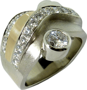 Redesigned engagement ring with white and yellow gold bezel set Hearts On Fire&reg; Diamond