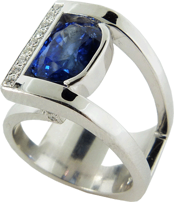 Blue Four Carat Sapphire Ring With Accent Diamonds