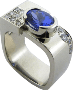 Semi-bezel set oval tanzanite and diamonds ring