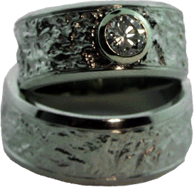 White Gold Lady's Wedding Band and Matching Men's Platinum Band with Reticulation Finish
