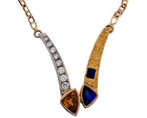 Yellow and blue Trillium cut sapphire pendant