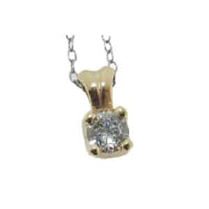 Yellow gold pendant set with a diamond