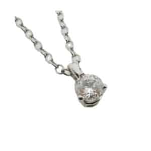 White metal pendant set with a round brilliant cut diamond