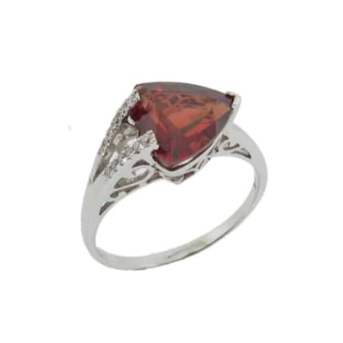 Tension set in 14 karat white gold showcasing a 1.535 carat trillion shaped Garnet. Accented with diamonds totaling 0.06 carats. This piece is perfect to represent January birthdays.