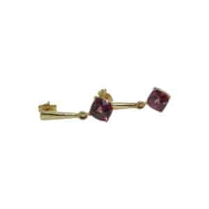 Claw set in a 14 karat yellow gold dangle earring setting, these cushion cut Rhodolite Garnets totaling 2.015 carats