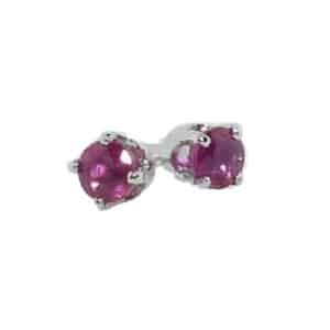 Claw set in 14 karat white gold are two round brilliant cut Rubies totaling 0.21 carats. These stud earrings are a perfect gift to represent July birthdays.