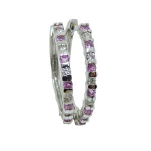 14k white gold hoop earrings featuring 0.304ctw of pink sapphires and 0.223ctw of round brilliant cut diamonds.