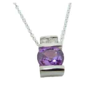 14k white gold pendant featuring a 1.095ct purple sapphire and two princess cut diamonds 0.077ctw, G/H, SI.