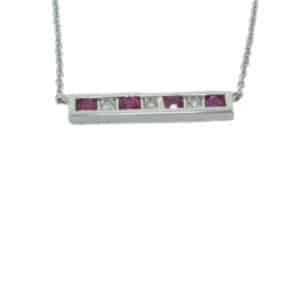 This 14 karat white gold bar necklace showcases four rubies totaling 0.14 carats, alternating with three diamonds totaling 0.02 carats. This is a perfect gift to represent July birthdays and 40th anniversaries.