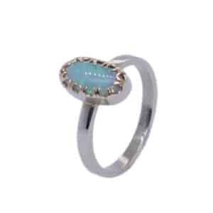14 karat white gold custom ring featuring a 0.889ct opal. This ring is a custom design by David.