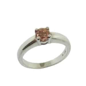 14 karat white gold ring set with a 0.665ct Imperial Topaz. This stunning ring is a custom design by David.