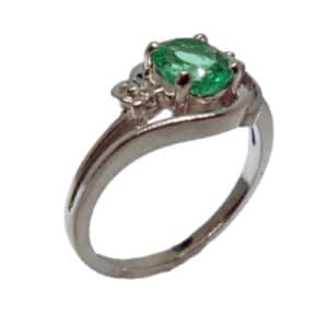 14 karat white gold ring set with a 0.815ct emerald and 0.04ctw round brilliant cut diamonds. Emerald is the birthstone for May.