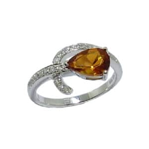 14 karat white gold ring set with a 1.21ct pear shaped citrine and 0.166ctw round brilliant cut diamonds. This stunning gemstone is the birthstone for November.