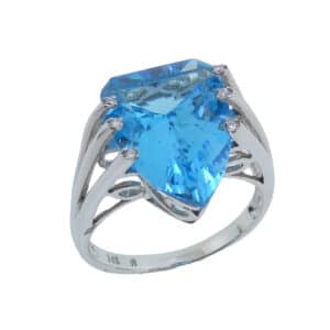 14 karat white gold modern design ring set with a 7.75ct Swiss Blue Topaz and accented with 6 = 0.03ct round brilliant cut diamonds.