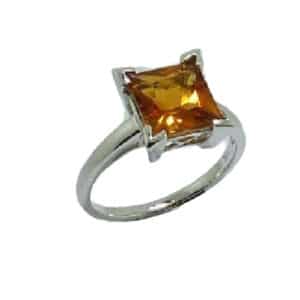 14 karat white gold ring featuring a 2.20ct princess cut citrine. This stunning gemstone is the birthstone for November.