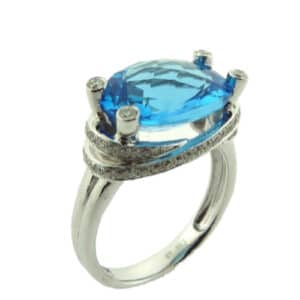 14 karat white gold ring featuring a 6.54ct Swiss blue topaz and accented with 65 = 0.43ctw of round brilliant cut diamonds.