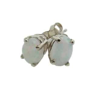 14 karat white gold gold earrings claw set with 2 = 0.50ctw opals. This gorgeous gemstone is the birthstone for November.