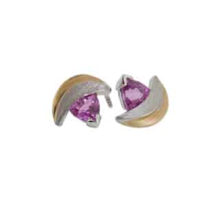 14K white and yellow gold custom stud earrings with locking backs by Studio Tzela featuring 2 pink trillion shape sapphires, 1.61cttw.