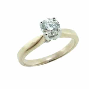 14 karat yellow gold solitaire engagement ring set with a 0.462ct Ideal cut, I, VS1 round brilliant cut diamond by Hearts on Fire.
