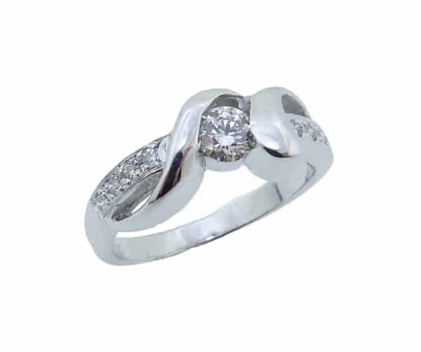 14K White gold custom engagement ring by Studio Tzela semi-bezel set with 0.281 carat ideal cut, Hearts On Fire diamonds, H, VS2 and accented on the band with 8 pave set, ideal cut, Hearts On Fire diamonds, 0.088cttw, G/H, VS-SI.