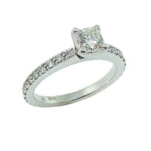 18K White gold engagement ring set with an ideal cut, Dream cut diamond by Hearts On Fire, 0.531 carat, G, SI1 and accented on the band with ideal cut, round brilliant cut Hearts On Fire diamonds, 0.33 carat total weight, G/H, VS-SI. See matching band: 125-10-1112.