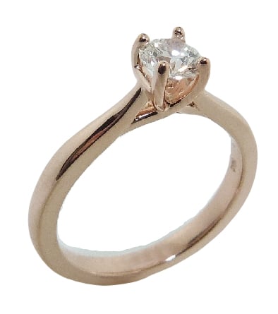 14 karat rose gold solitaire engagement ring featuring a 0.434ct G, SI1 round brilliant cut diamond by Hearts on Fire.