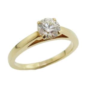 18K yellow gold Simply Bridal solitaire engagement ring set with a 0.72ct, Ideal cut, J, VVS2, Hearts on Fire center round brilliant cut diamond.