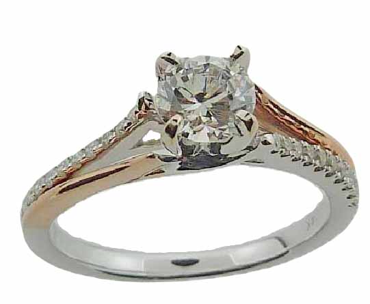 14 karat white and rose criss cross design solitaire engagement ring featuring 20 = 0.13ctw  G/H, SI round brilliant cut diamonds. This unique design is a great alternative to a traditional solitaire ring. Priced without a center gemstone. Let us find you the perfect center that fits your tastes and budget!