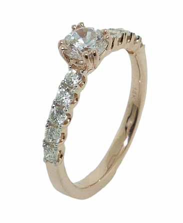 14 karat rose vintage design solitaire engagement ring featuring 10 = 0.35ctw round brilliant cut diamonds. This unique design is a great alternative to a traditional solitaire ring. Priced without a center gemstone. Let us find you the perfect center that fits your tastes and budget!