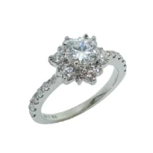 14 karat white gold floral design halo engagement ring accented by 0.275ctw round brilliant cut diamonds. This unique design is a great alternative to a traditional halo ring. A matching band is available. Priced without a center gemstone. Let us find you the perfect center that fits your tastes and budget!