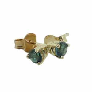 A cute pair of 14 karat yellow gold stud earrings. Showcasing two blue-green Tourmalines totaling 0.28 carats. The perfect gift for 8th anniversaries.