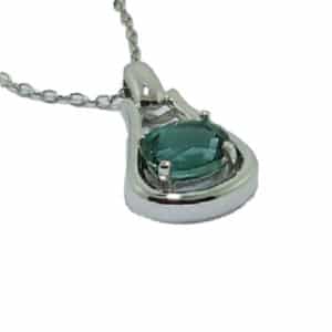 A fun 14 karat white gold pendant. Showcasing a 2.04 carat oval shaped Tourmaline. The perfect gift for 8th anniversaries.