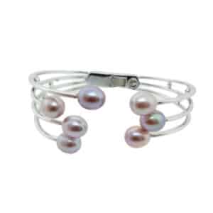 Sterling silver modern design multi row bangle featuring 7 freshwater pearls. Pearl is the birthstone for June.