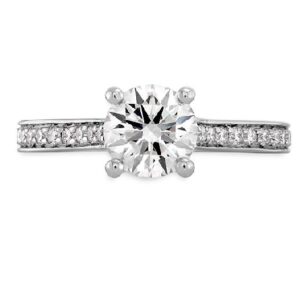 18 karat white gold Enticement engagement ring set with a 0.75ct CZ and accented by 0.23ctw G/H, VS/SI round brilliant cut Hearts On Fire diamonds. This style is now discontinued.