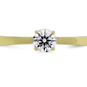 Signature solitaire engagement ring by Hearts on Fire is available in 18 karat yellow and white gold as well as platinum.