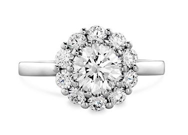 18KW Beloved Open Gallery Halo Hearts On Fire engagement ring set with 0.50ct CZ and accented on the halo with 11 ideal cut, Hearts On Fire diamonds, 0.276cttw, I/J, VS-SI. This style is discontinued and no longer available for reorder.