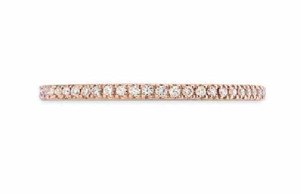 18 Karat rose gold Hearts On Fire eternity band totaling 0.22 carats of diamonds, I/J, SI. Also available in yellow and white gold.