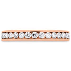 18 karat rose gold wedding band channel set with ideal cut, round brilliant cut diamonds by Hearts On Fire, 0.45 carat total weight, H/I, VS.