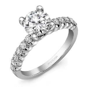 14 karat white engagement ring accented by 12 = 0.38ctw G/H, SI round brilliant cut diamonds.