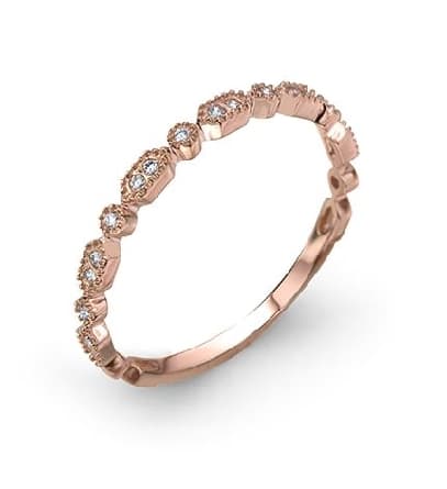 14 karat rose gold band set with 0.08ctw round brilliant cut diamonds. This stunning ring features milgrain engraving and is beautiful by itself or as part of a stack.