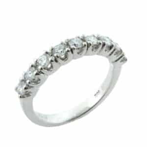 14K White gold lady's wedding band claw set with 9 round brilliant cut diamonds, 0.623ctw, G/H, VS.