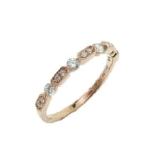 14 karat rose gold band set with 14 = 0.31ctw G/H, SI round brilliant cut diamonds. This stunning ring features milgrain engraving and is beautiful by itself or as part of a stack.