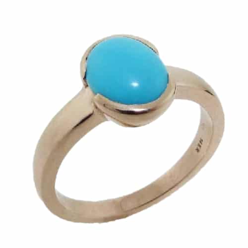 14 karat rose gold ring featuring a 1.27ctw Turquoise. This stunning ring is a custom Design by David.