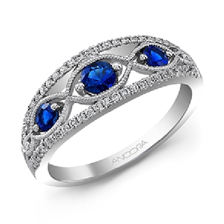 14 karat white gold vintage style ring with 3 = 0.05ctw of round blue sapphires and 52 = 0.19ctw of round brilliant cut diamonds.