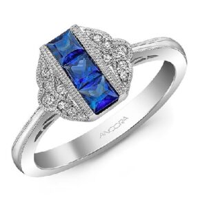 14 karat white gold ring set with 3 square cut sapphires and accented with a halo of diamonds.