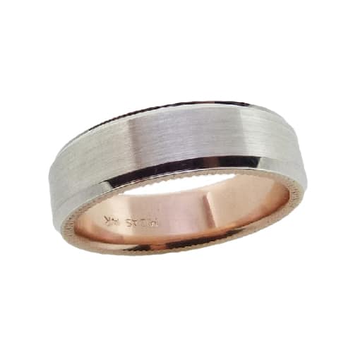 14 Karat white gold 7mm beveled edge band with a rose gold sleeve accented with a stainless finish in the centre and polished edges and a coin edge detail. This ring is available in 14K/18K white, yellow or rose gold and platinum and in any width or finish.