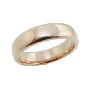 14 Karat rose gold 6.5mm polished domed band. This ring is available in 14K/18K white, yellow or rose gold and platinum and in any width or finish.